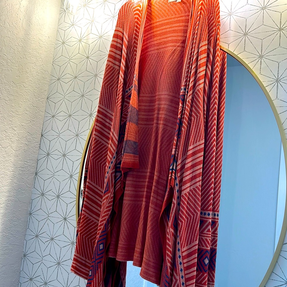 Umgee sweater size large .